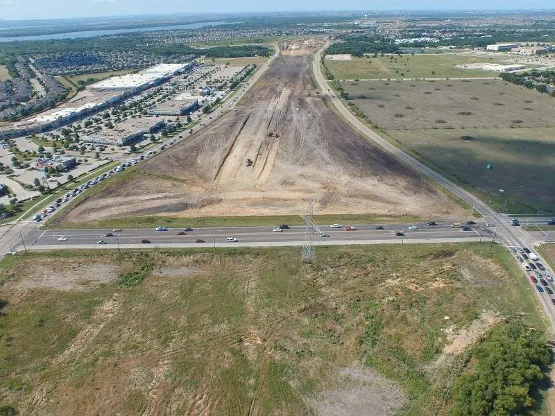 An aerial view of a runway and the construction area.
